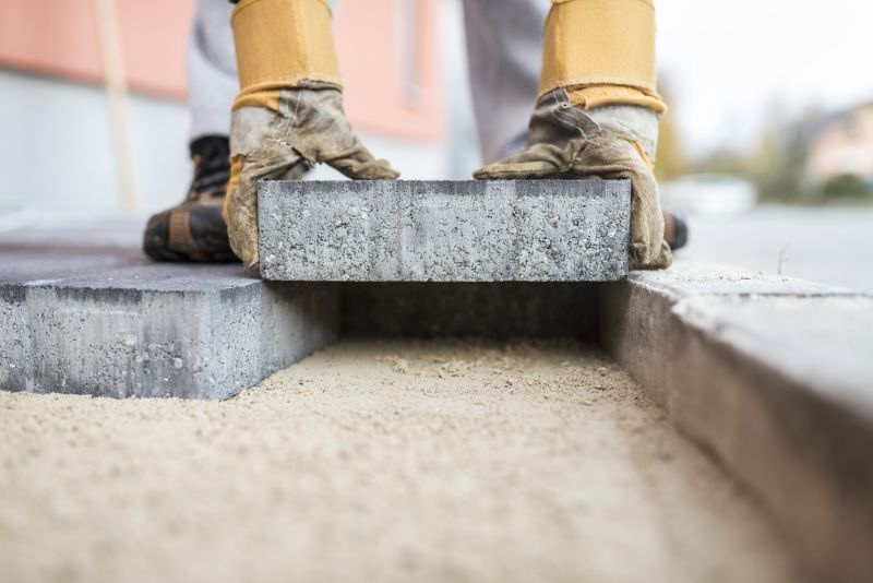 Concrete Walkways Vs. Pavers: Which Option Fits Your Property Best